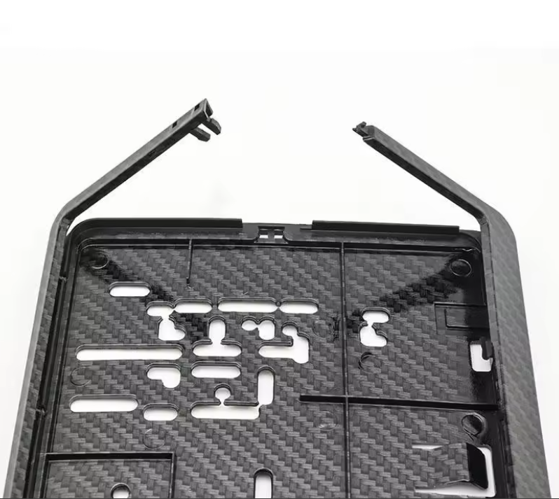 NUMBER PLATE HOLDER CARBON FIBRE STYLE X 2 (+£21.99) (STANDARD SIZE) Two number plate holders - no fittings needed - screw the holder to your original number plate holes and attach plates.